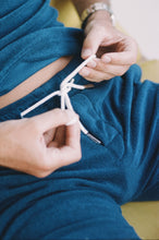 Load image into Gallery viewer, Navy Blue Terry Shorts - Close Up Lifestyle Picture